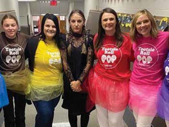 Britton-Hecla staff dressed as tasty looking Tootsie Pops for Halloween on Tuesday