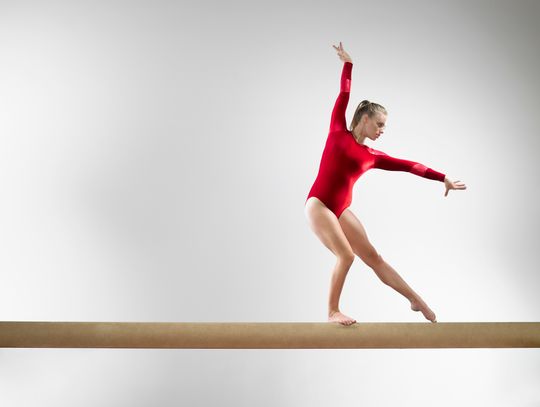 GYMNASTS BEGIN TUESDAY