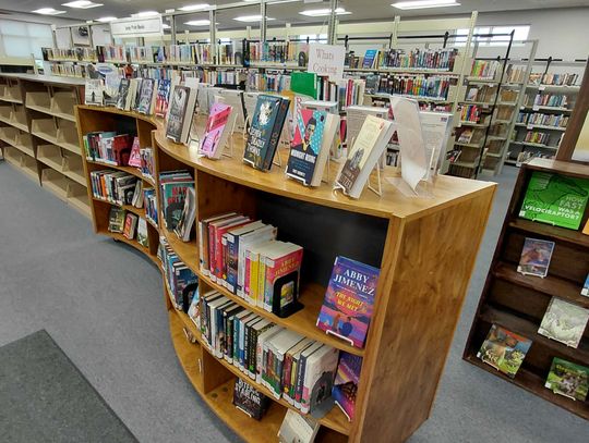 LOCALS LEND HANDS FOR LIBRARY SHELVES