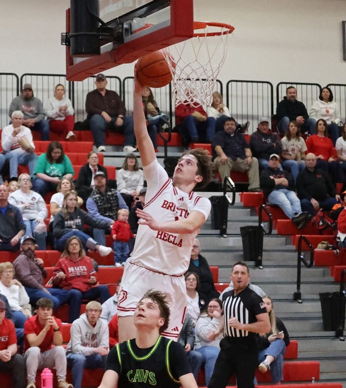 BRAVES WIN REGION OPENER BRAVES WIN REGION OPENER