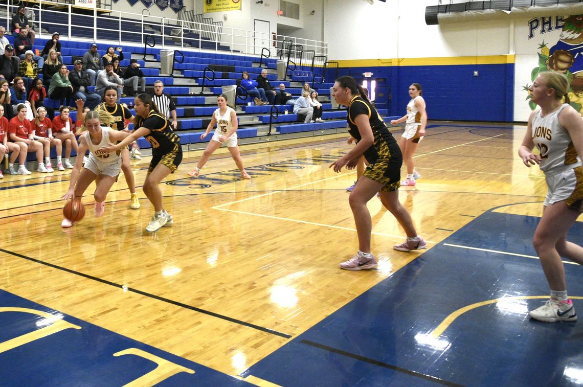 LADY LIONS WIN SEVENTH