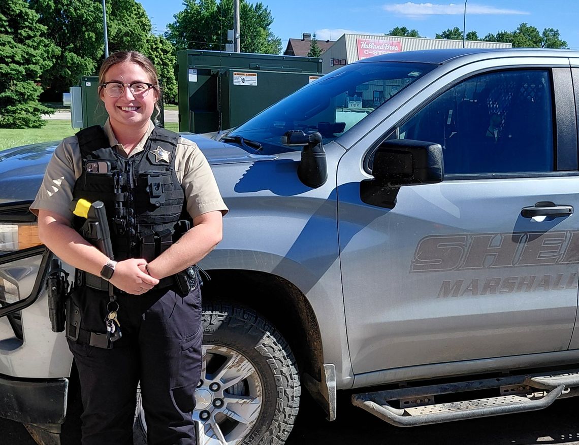 SHE'S READY TO PROTECT AND SERVE SHE'S READY TO PROTECT AND SERVE