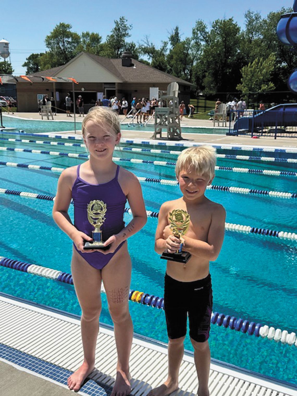 SWIMMERS COMPETE AT WEBSTER